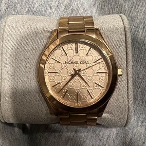 Women’s rose gold Michael Kors watch